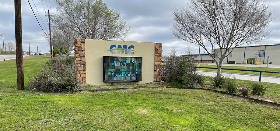 Exterior photo from the road showing the facility sign that reads "CMC"
