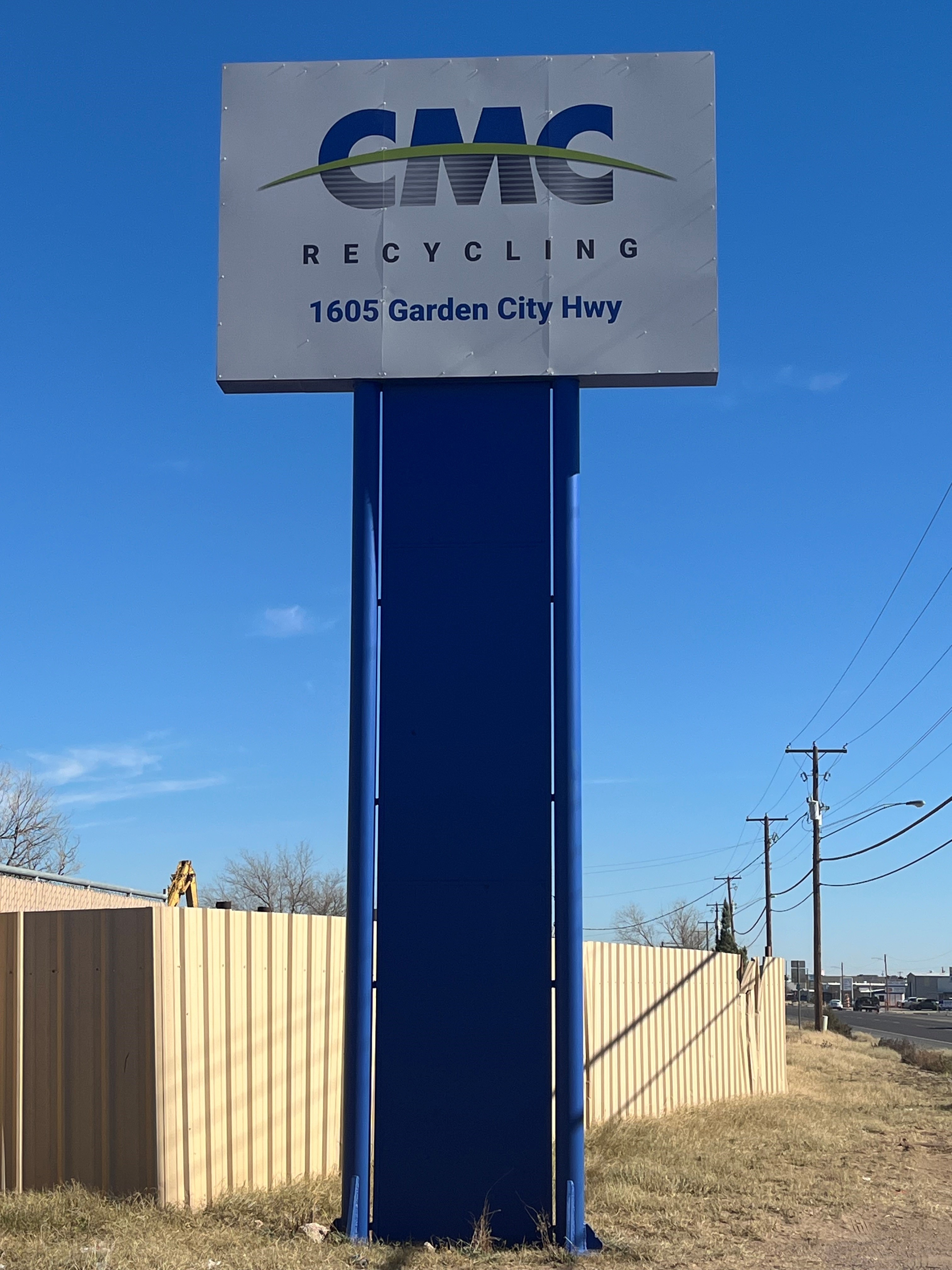 Photo from the street showing CMC Recycling Midland's main sign featuring CMC logo